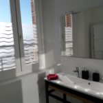 Bathroom with window and large high-end double sink