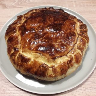 Homemade confit duck pie served for dinner at the table d’hotes