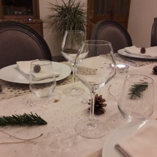 Beautiful natural and refined decoration for New Year’sEve dinner table