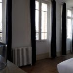The very bright suite Water with its large windows and beautiful blue velvet curtains