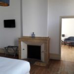 Guest room water with fireplace and flat screen television