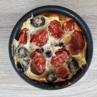 Olive and tomato flan served as a starter at the table d'hotes