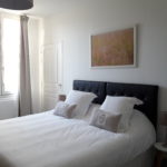 Guest room earth with very comfortable king size bed and soft pillows